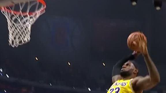 AD dishes to LeBron for one-handed slam