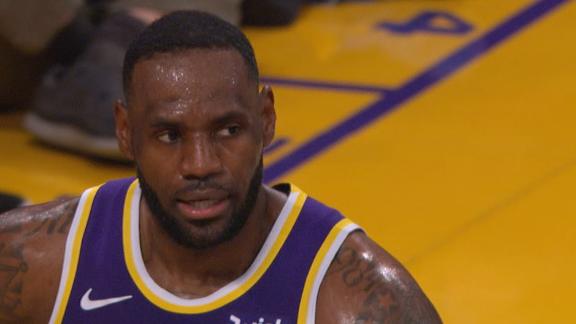 LeBron stuffs Paschall's layup attempt