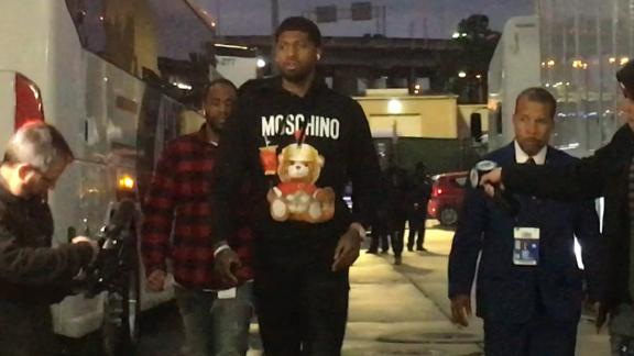 Paul George arrives for his debut with Clippers