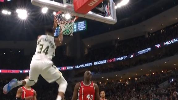 Giannis schools Tolliver for reverse jam