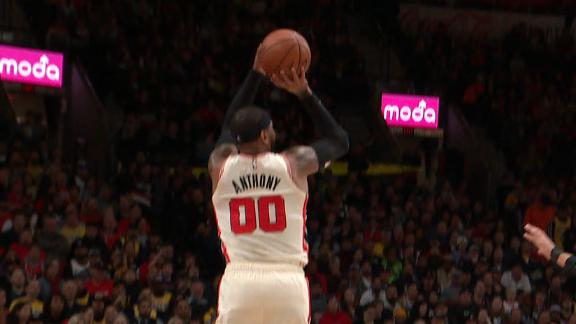 Melo gets free, buries triple