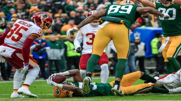 Jones bursts into the end zone for a 4-yard TD