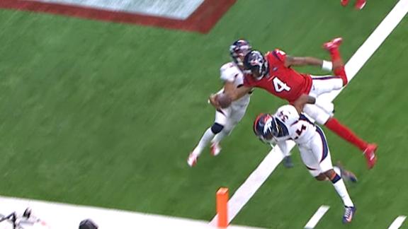 Watson gets airborne for a 6-yard TD