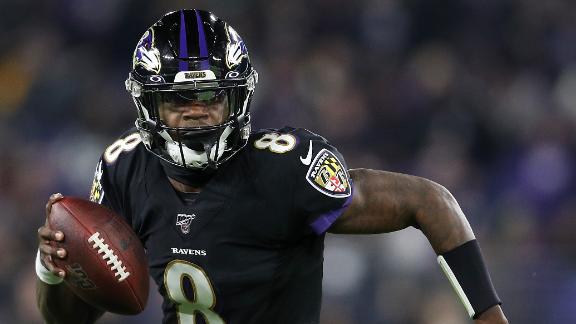 Jackson breaks Vick's single-season QB rushing record
