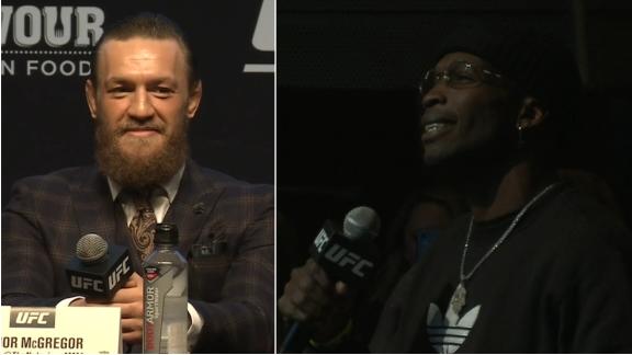Ochocinco asks McGregor a question at presser