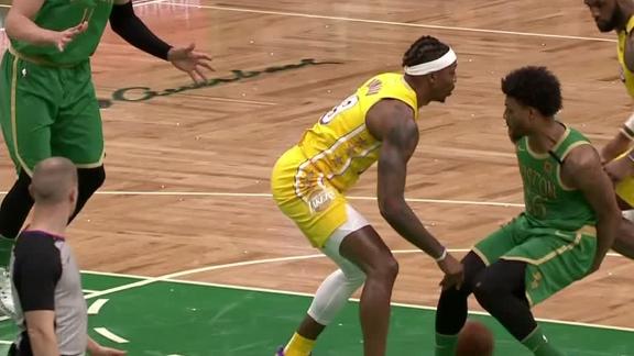 Smart goes behind the back to Kanter for the layup