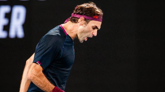 Federer overcomes Millman in 5-set epic