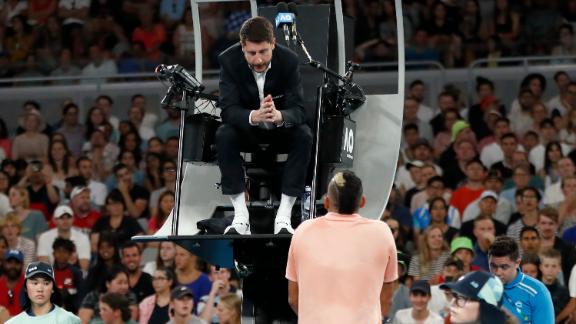 Kyrgios lashes out at umpire over injured hand