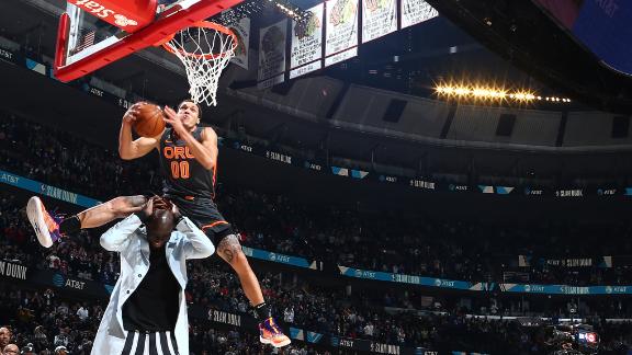 Gordon dunks over Tacko Fall for incredible slam