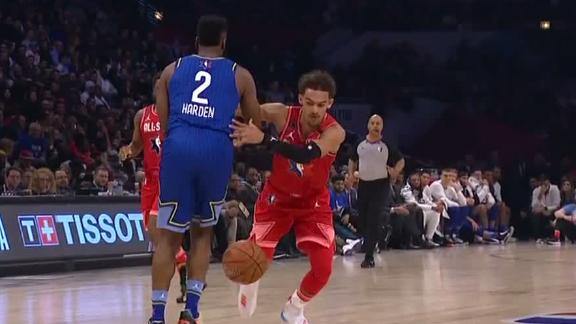 Young dribbles the ball through Harden's legs