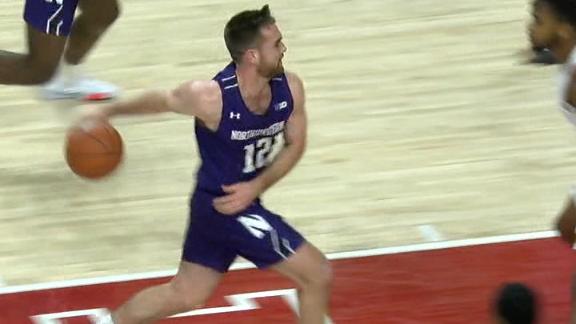 Spencer lets Maryland hear it after faking the behind-the-back pass for a layup