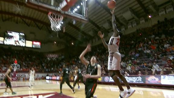 Radford's ridiculous shot from behind the backboard drops