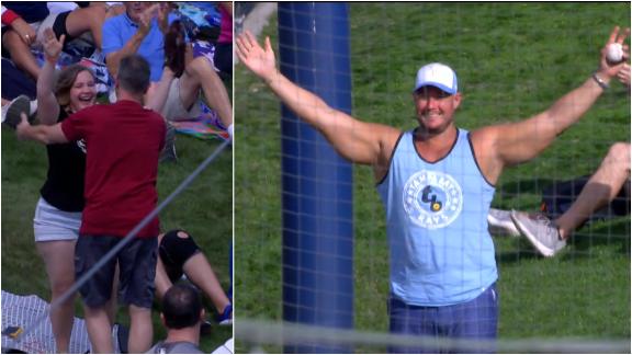 Which fan made the better leaping catch?
