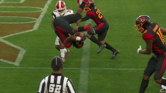 Carter flips into the end zone for TD