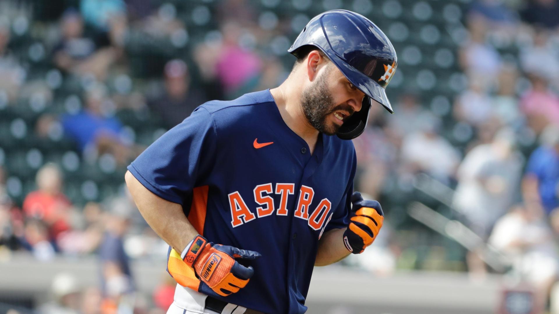 Altuve booed, hit by pitch in spring training debut