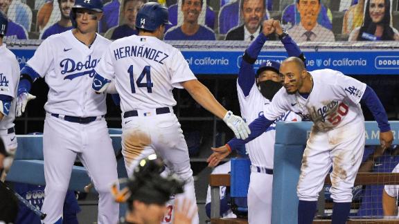 Hernandez 5 RBIs, Dodgers beat Giants 8-1 in fan-less opener