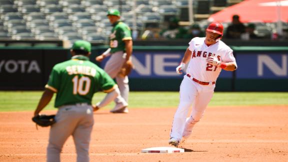 A's hit 3 HRs, Laureano's 3 fine catches help top Angels 8-4