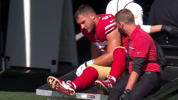 49ers' Nick Bosa carted off with likely torn ACL