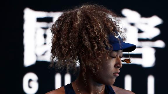 Watch how Naomi Osaka delicately frees a butterfly mid match 