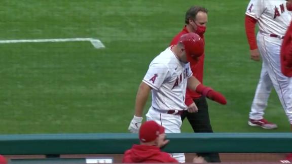 Trout limps off the field with apparent injury