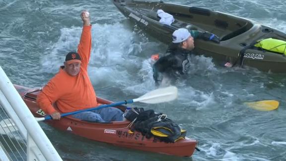 Giants fans have intense kayak race over home run ball