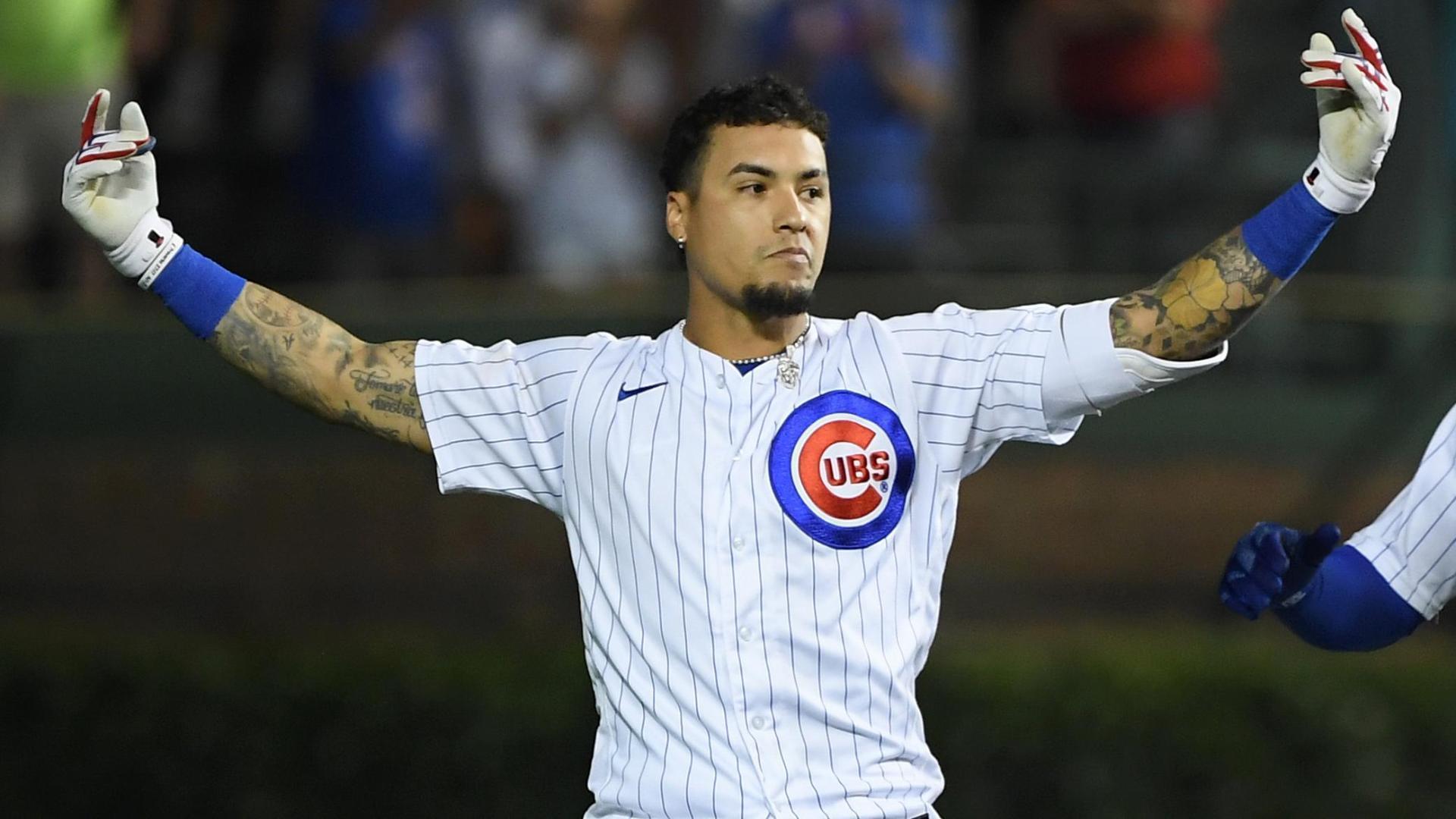 Baez lets Reds hear it after walking Cubs off in 9th