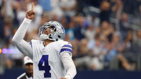 Prescott lights up Panthers' defense with 4 TD passes