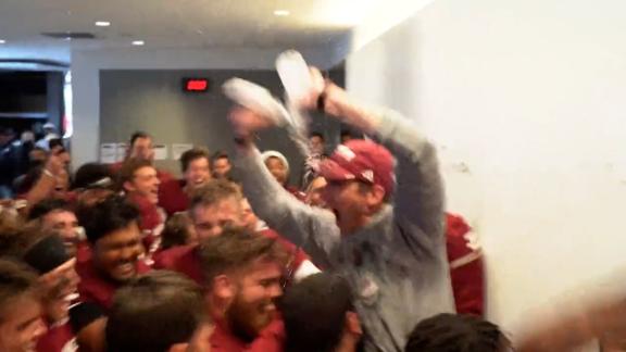 UMass football team goes berserk in locker room following win