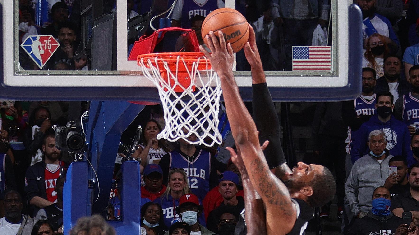 Durant's tripledouble rallies Nets past 76ers