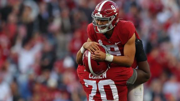 Bama's Young explodes in record-setting win over Hogs