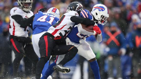 Devin Singletary carries a defender into the end zone for a Bills TD