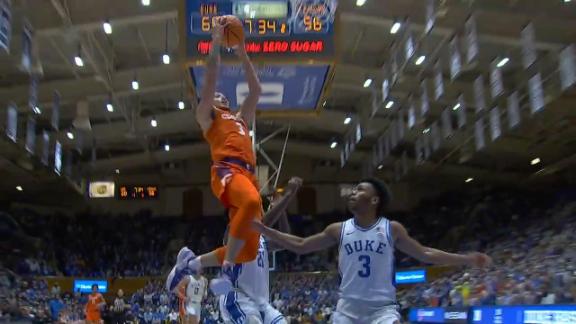 Chase Hunter drives to the basket for a big Clemson dunk