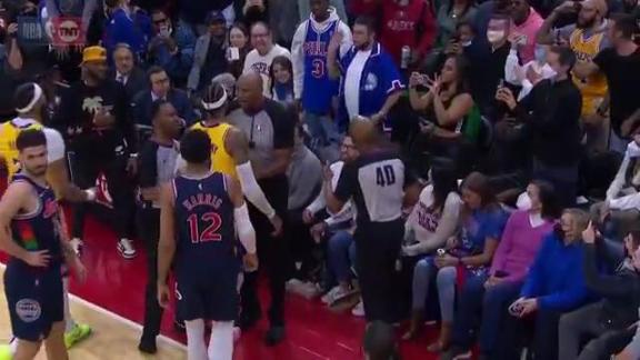 Fans ejected after altercation with Melo