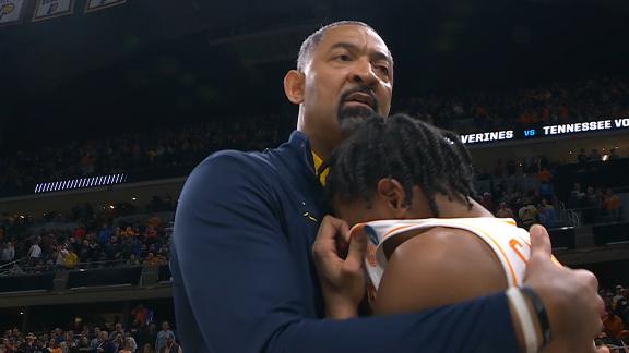 Juwan Howard consoles a sobbing Kennedy Chandler after Tennessee falls to Michigan