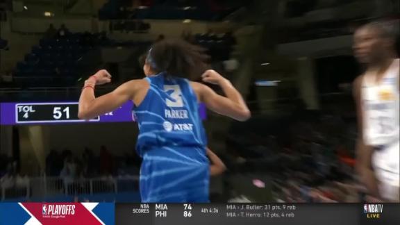 Candace Parker flexes after throwing up and-1