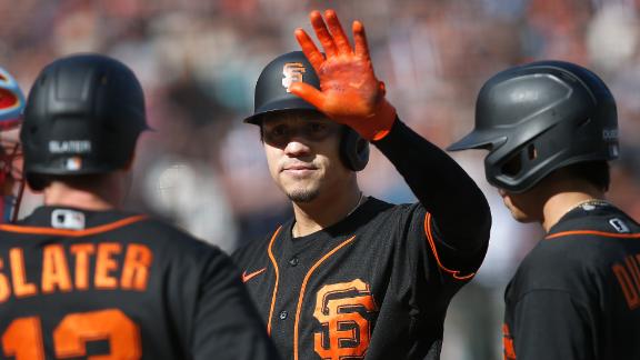 Flores slam, 6 RBIs as Giants thump Cards; Posey honored