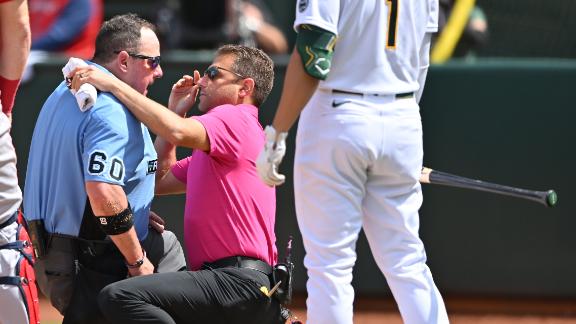Umpire exits Angels-A's game after getting hit twice