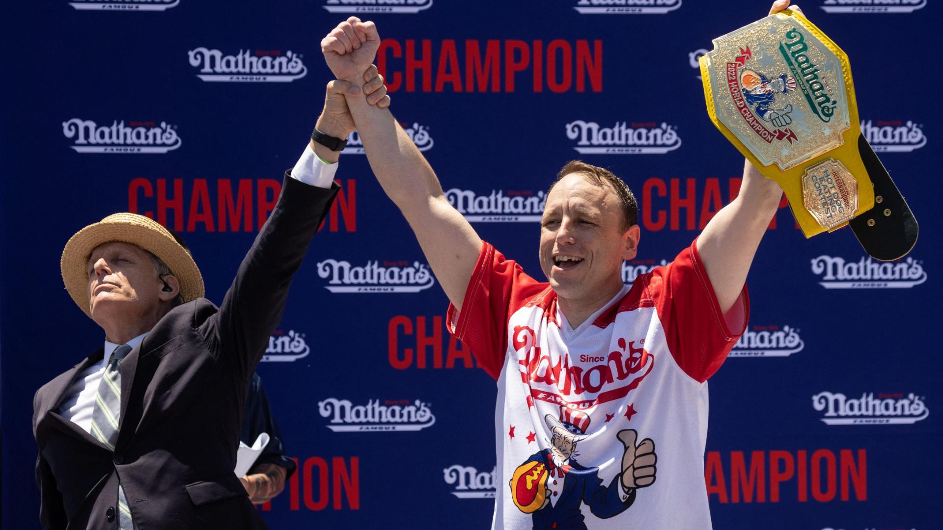 Joey 'Jaws' Chestnut, slowed by injury, captures 15th of hot dog eating contest title 63 franks and buns