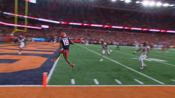 Fans rush field after Orange beat NC State at the Dome