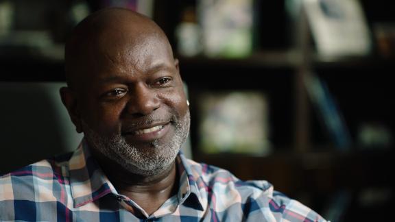 Arizona Cardinals running back Emmitt Smith smiles at teammates