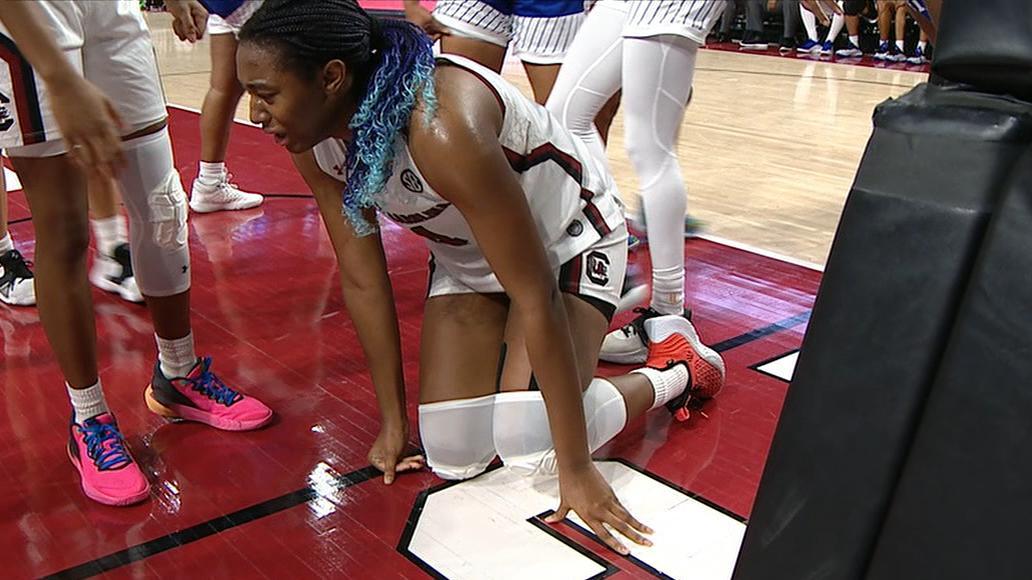 Aliyah Boston slow to get up after a hard fall