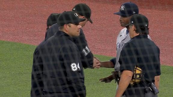 MLB umpire suspended for grabbing player