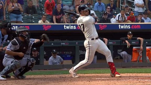 Remillard's 2 big hits off the bench in MLB debut rally the White