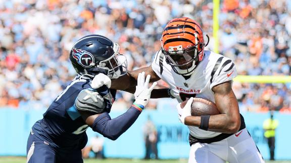 Henry runs for TD, throws for score as Titans rout Burrow, Bengals 27-3