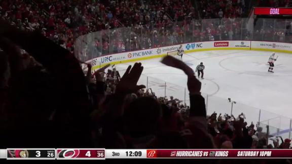 Carolina Hurricanes players celebrate after defeating the