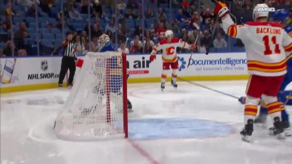 Adam Ruzicka scores the go-ahead goal for the Flames, who beat the sloppy  Sabres 4-3