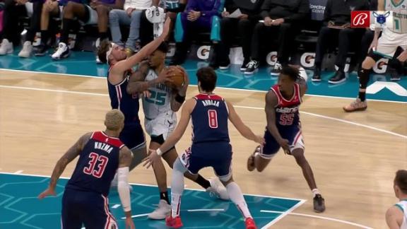 Charlotte Hornets forward Gordon Hayward (20) brings the ball up court  against the Washington Wizards during the first half of an NBA basketball  game in Charlotte, N.C., Wednesday, Nov. 17, 2021. (AP