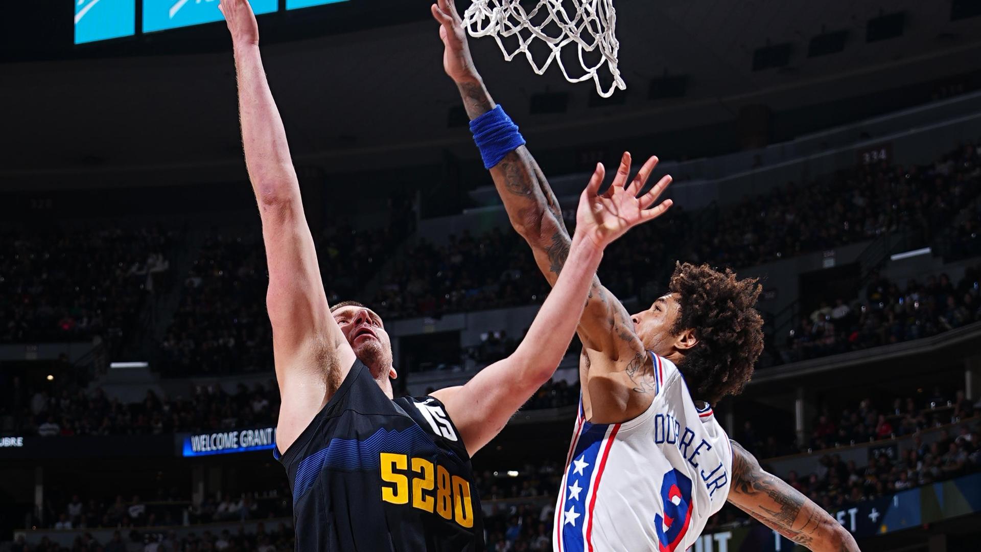Jokic, Nuggets fend off gritty 76ers 111-105 as Embiid sits out