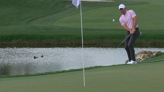 Rory McIlroy chips in for birdie to get back to par
