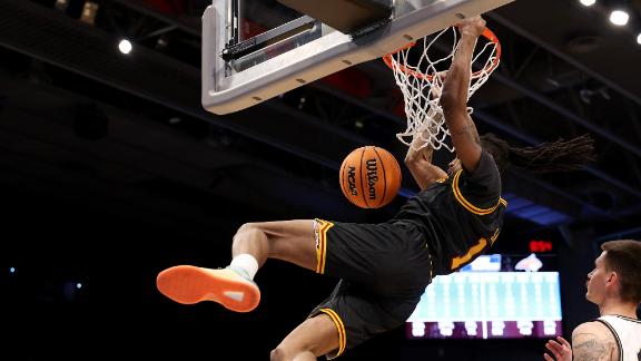 Grambling's Jourdan Smith's putback dunk puts the Tigers up 4 late in OT